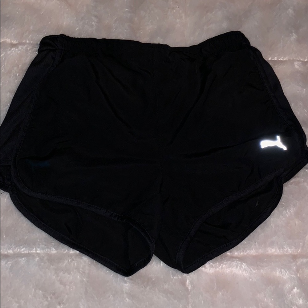 Puma running shorts.